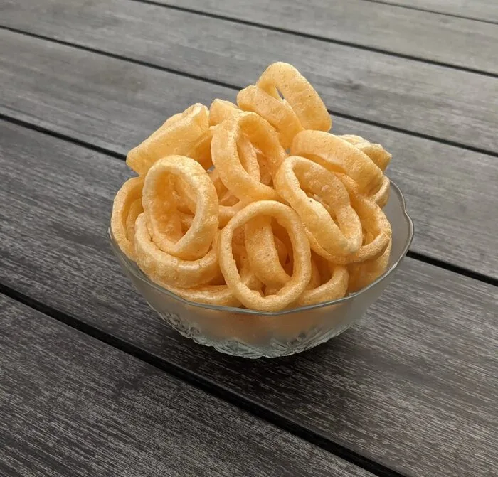 Bowl of golden fried Swirly's Onion Rings Fryums